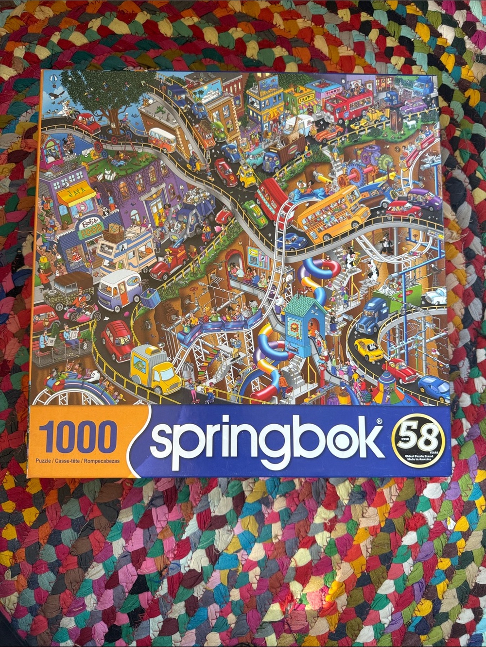 Springbok 1000-Piece Jigsaw Puzzle – Colorful Amusement City (Blue & Orange)